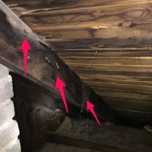 Roofing leak at the chimneys flashing